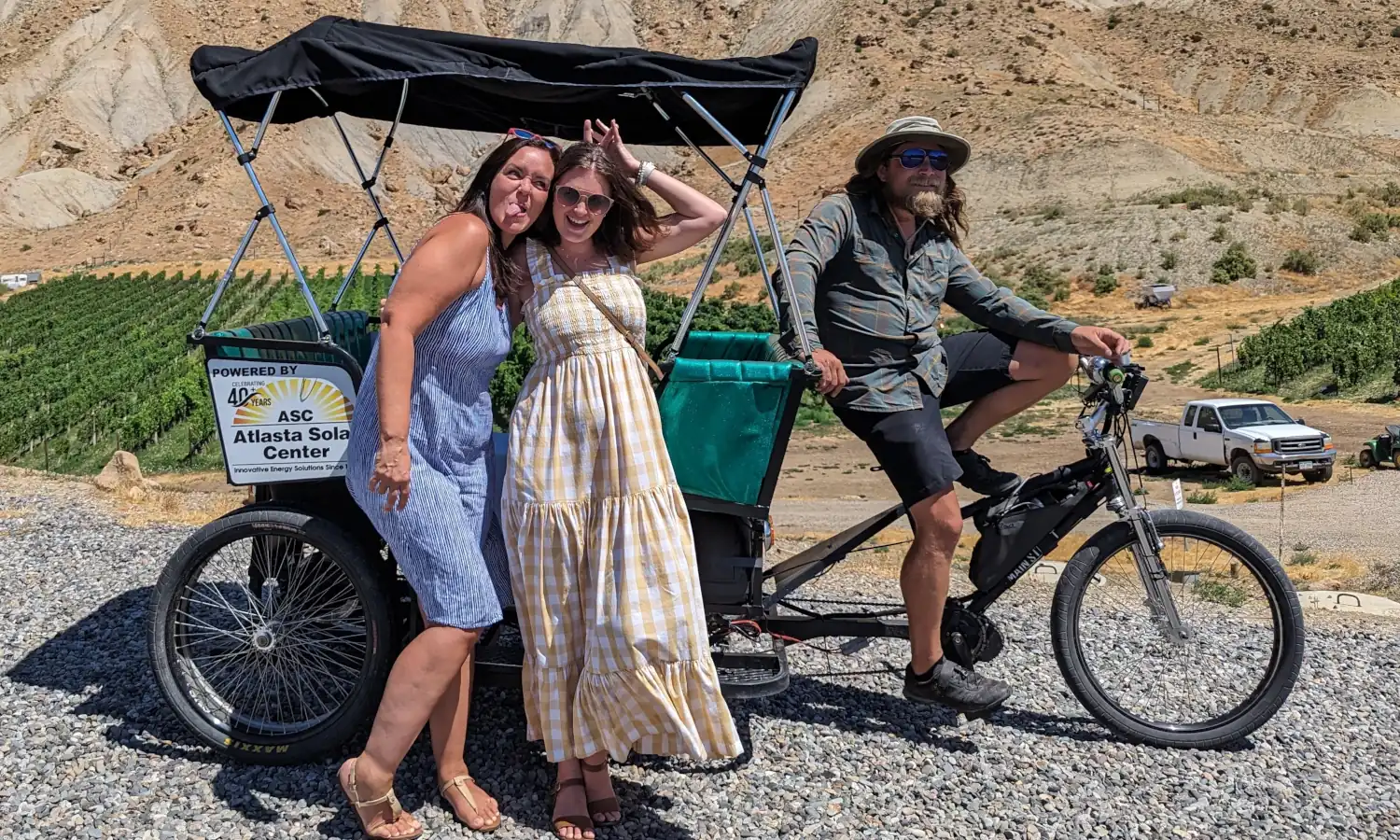 Friends enjoying Bookcliff Vineyards with Palisade Pedicab in Palisade, CO